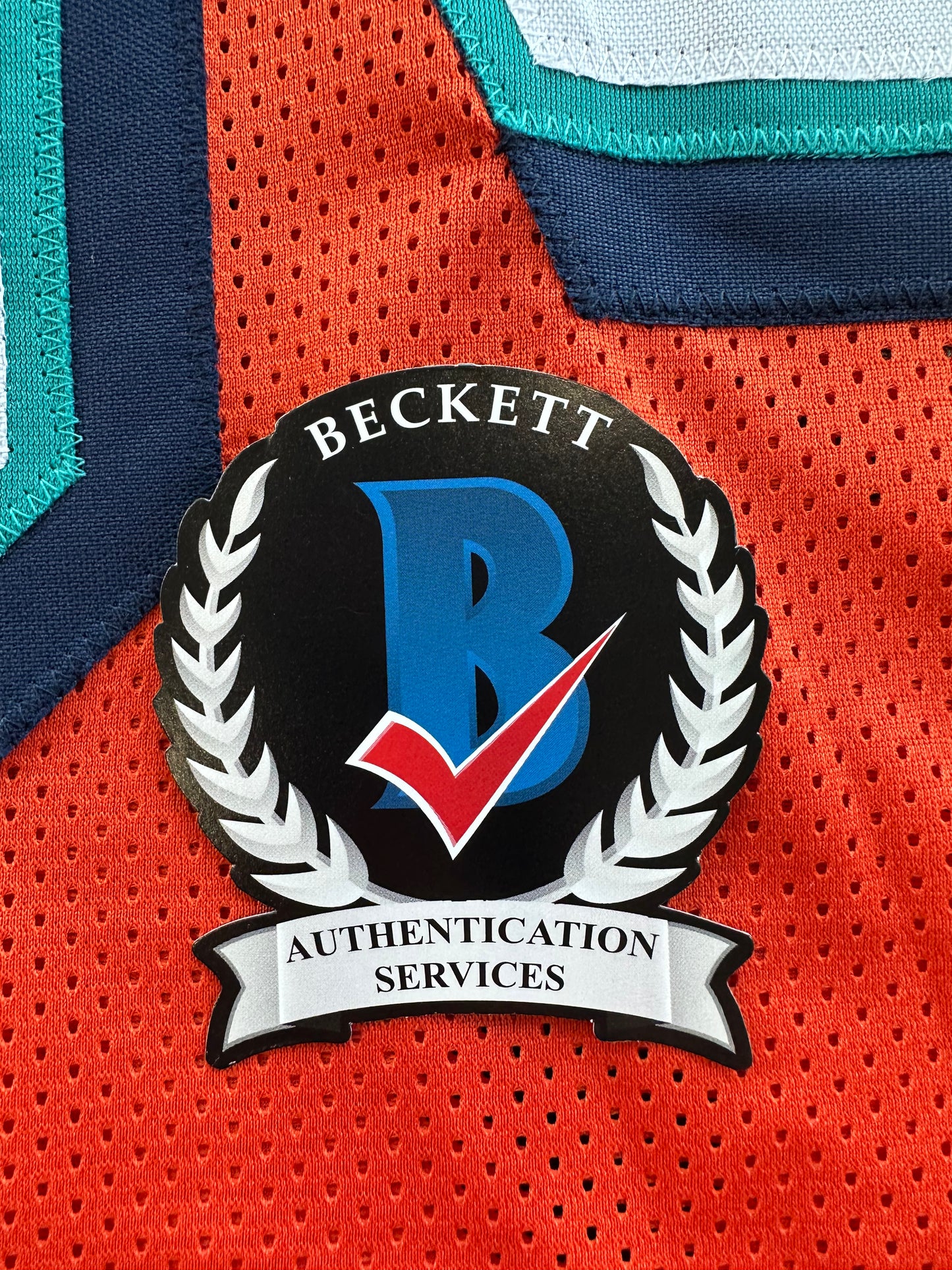 ZACH THOMAS SIGNED ORANGE FOOTBALL JERSEY Miami Dolphins BAS