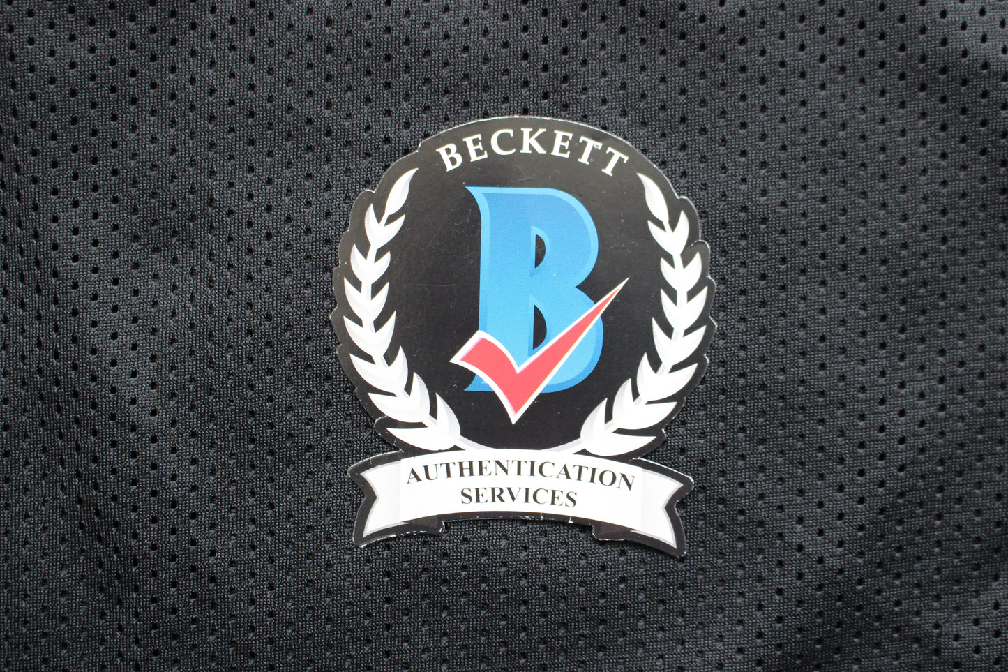 ROCKET ISMAIL RAIDERS SIGNED BLACK JERSEY w/JUST WIN BABY BAS COA