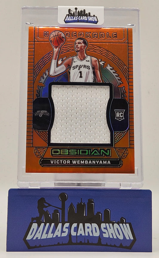 2023-24 Panini Obsidian #UM-WEM Victor Wembanyama Orange Unbreakable Relic /99