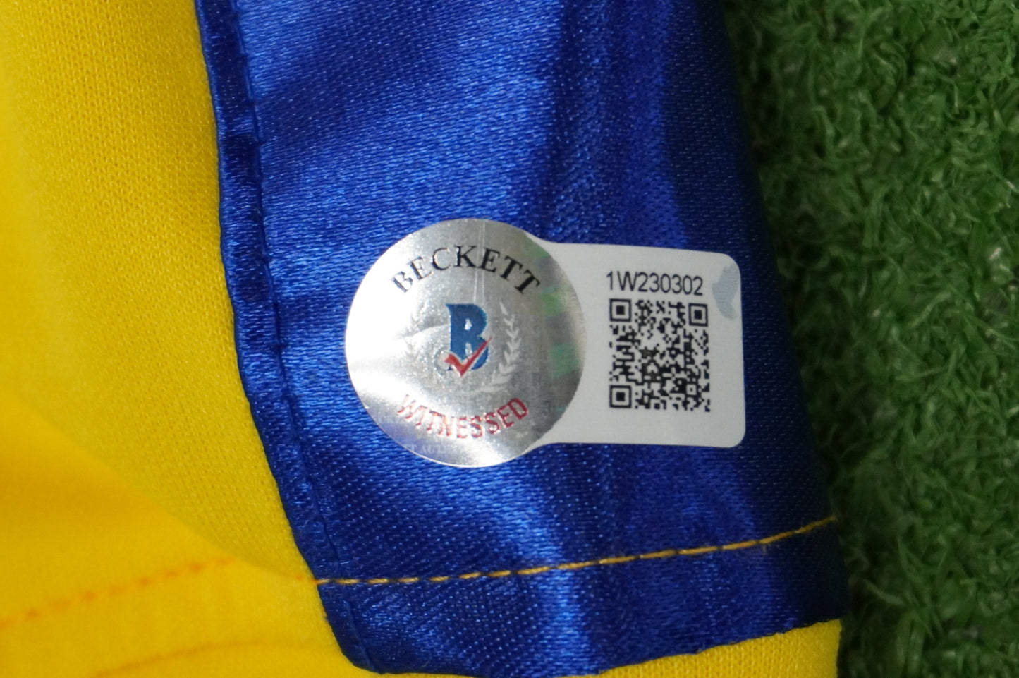 KEVIN VON ERICH SIGNED WRESTLING YELLOW and BLUE TRUNKS BAS COA