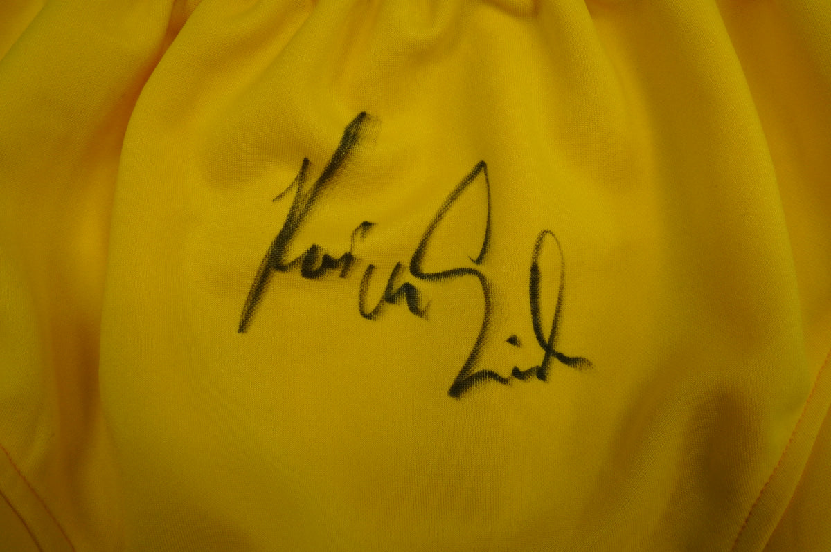 KEVIN VON ERICH SIGNED WRESTLING YELLOW and BLUE TRUNKS BAS COA
