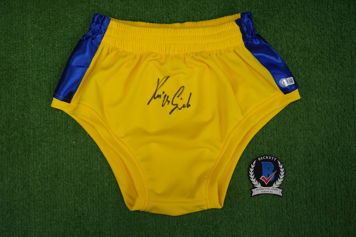 KEVIN VON ERICH SIGNED WRESTLING YELLOW and BLUE TRUNKS BAS COA