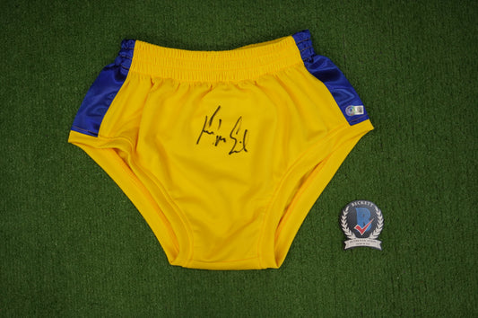 KEVIN VON ERICH SIGNED WRESTLING YELLOW and BLUE TRUNKS BAS COA