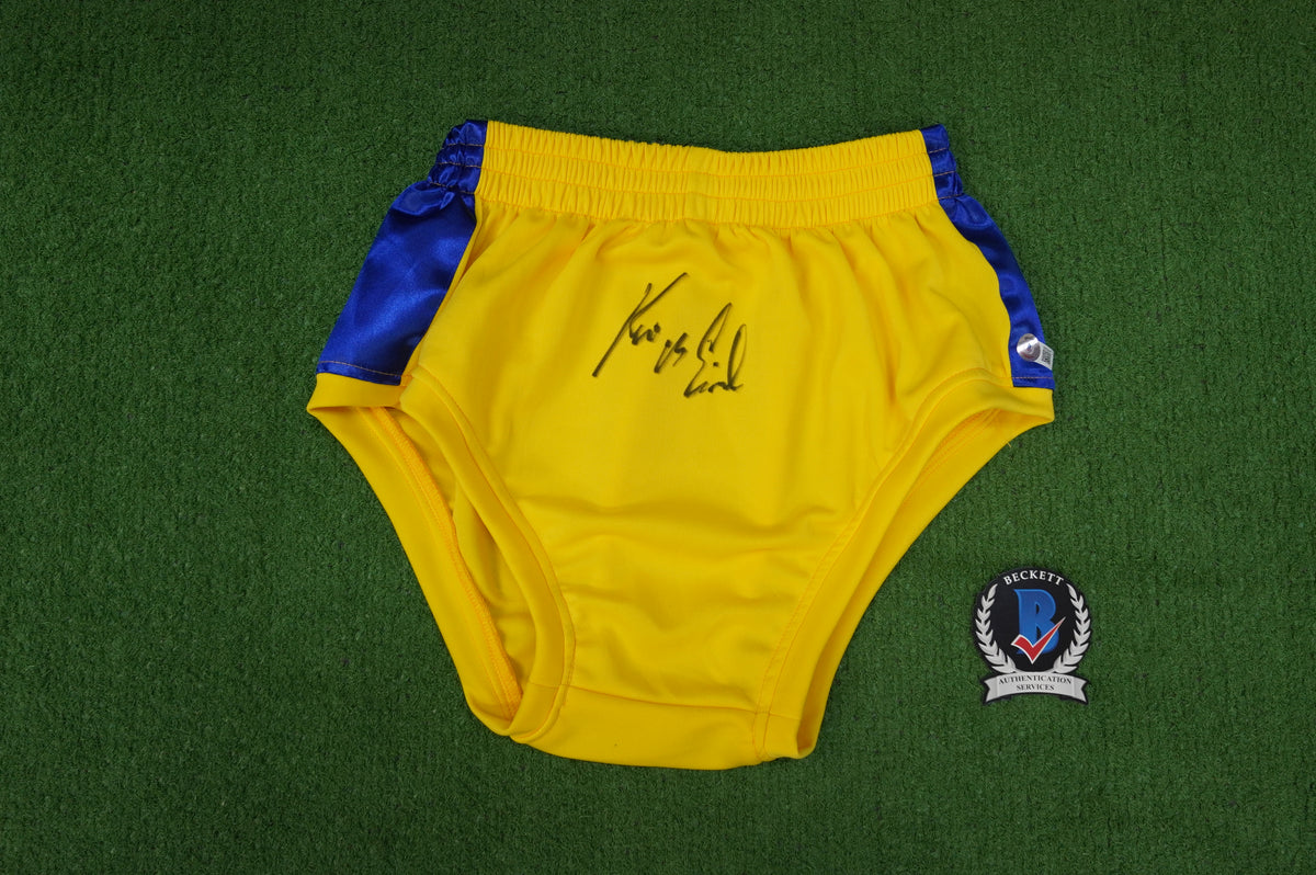 KEVIN VON ERICH SIGNED WRESTLING YELLOW and BLUE TRUNKS BAS COA
