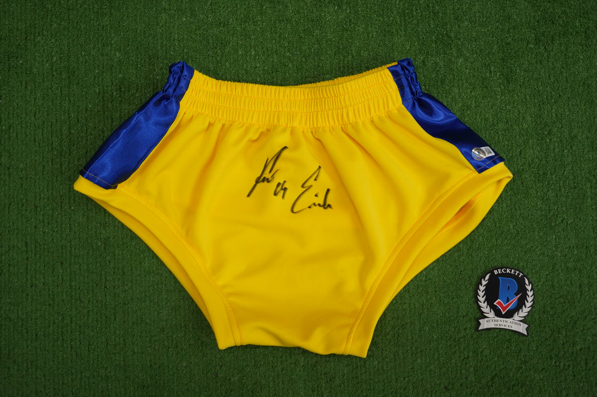 KEVIN VON ERICH SIGNED WRESTLING YELLOW and BLUE TRUNKS BAS COA