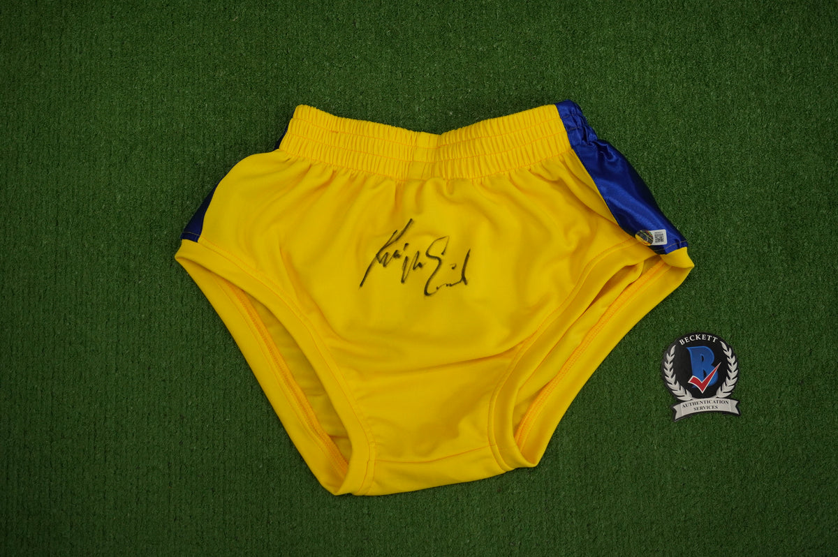 KEVIN VON ERICH SIGNED WRESTLING YELLOW and BLUE TRUNKS BAS COA