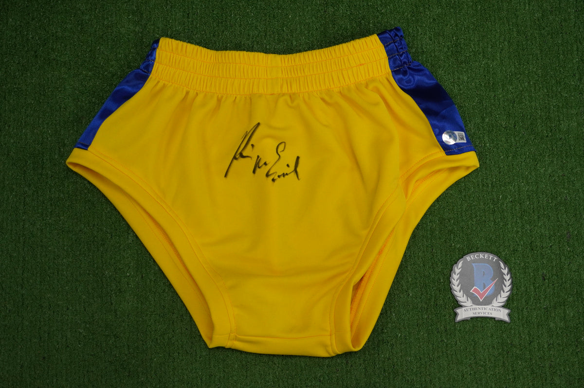KEVIN VON ERICH SIGNED WRESTLING YELLOW and BLUE TRUNKS BAS COA