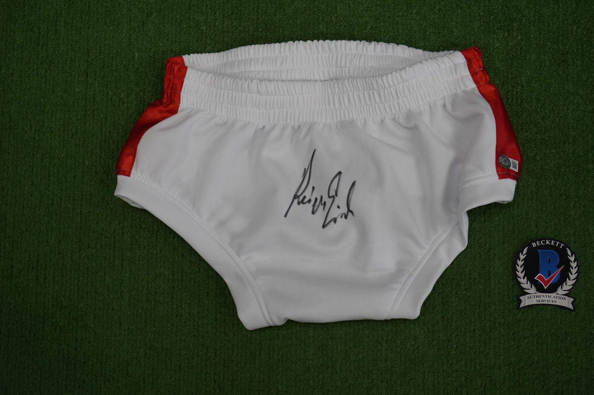 KEVIN VON ERICH SIGNED WHITE WRESTLING TRUNKS BAS COA
