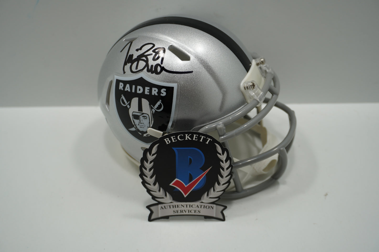 TIM BROWN SIGNED LA OAKLAND RAIDERS Riddell MINI HELMET BAS COA