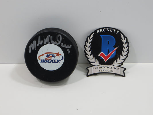 MIKE MODANO TEAM USA SIGNED HOCKEY PUCK Dallas Stars Red Wings North Stars BAS