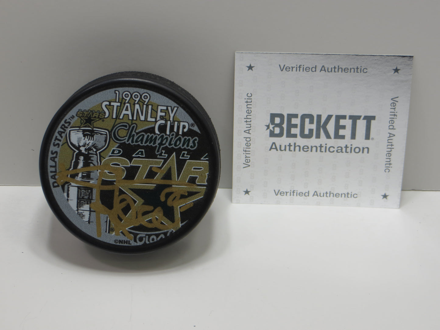 DERIAN HATCHER DALLAS STARS SIGNED 1999 Stanley Cup Puck BAS COA