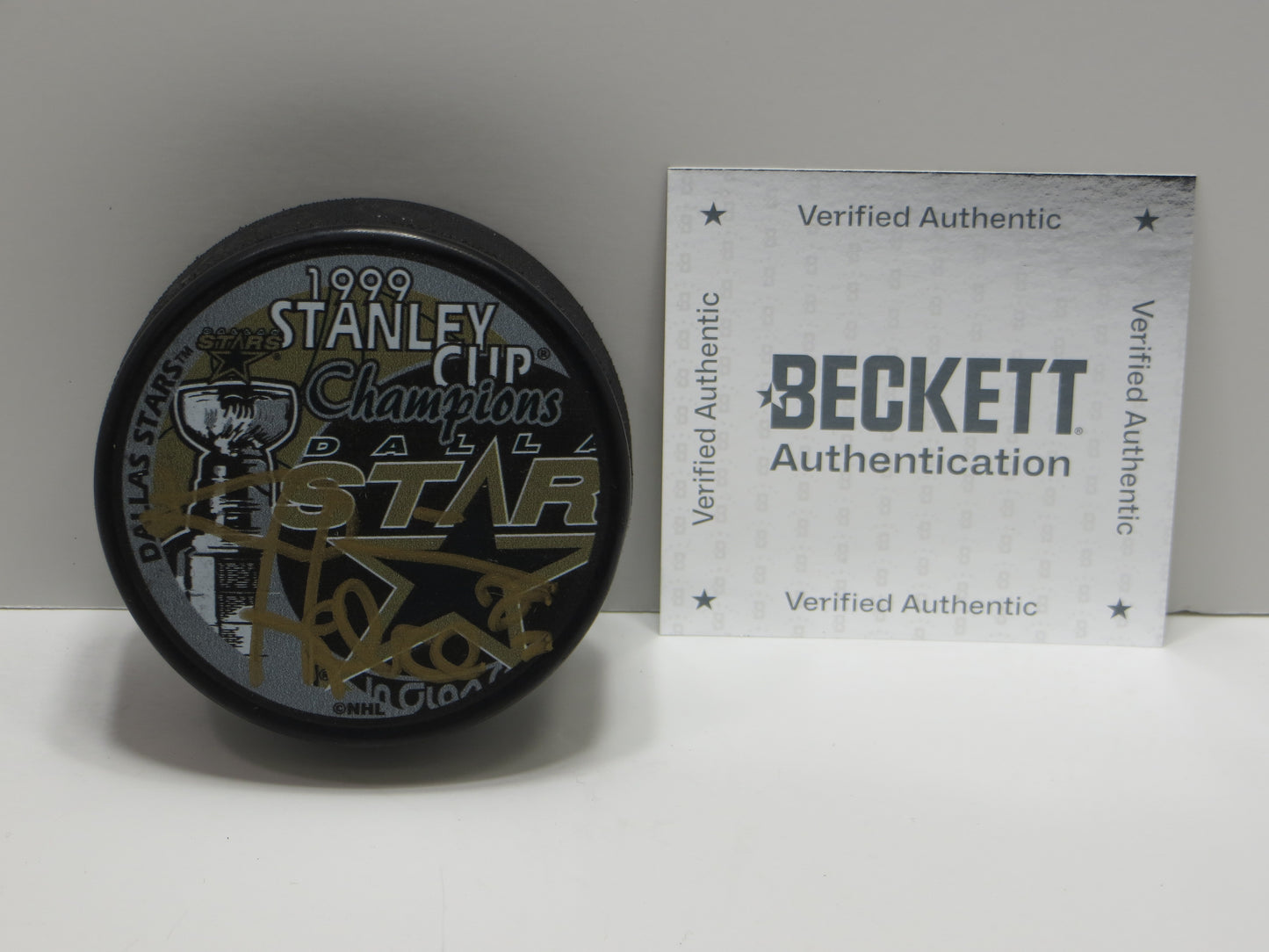 DERIAN HATCHER DALLAS STARS SIGNED 1999 Stanley Cup Puck BAS COA