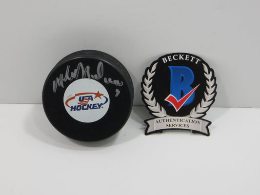 MIKE MODANO TEAM USA SIGNED HOCKEY PUCK Dallas Stars Red Wings North Stars BAS