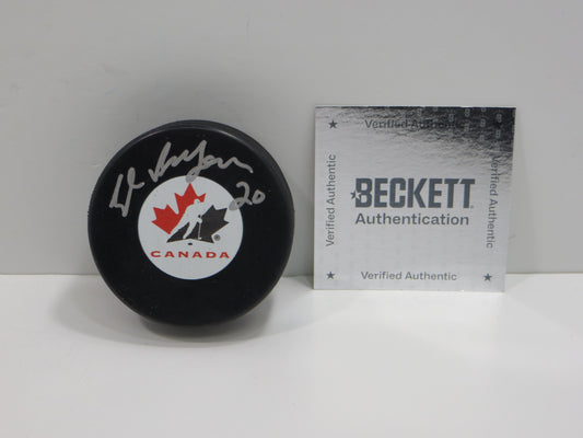 ED BELFOUR TEAM CANADA SIGNED HOCKEY PUCK Dallas Stars Blackhawks BAS COA