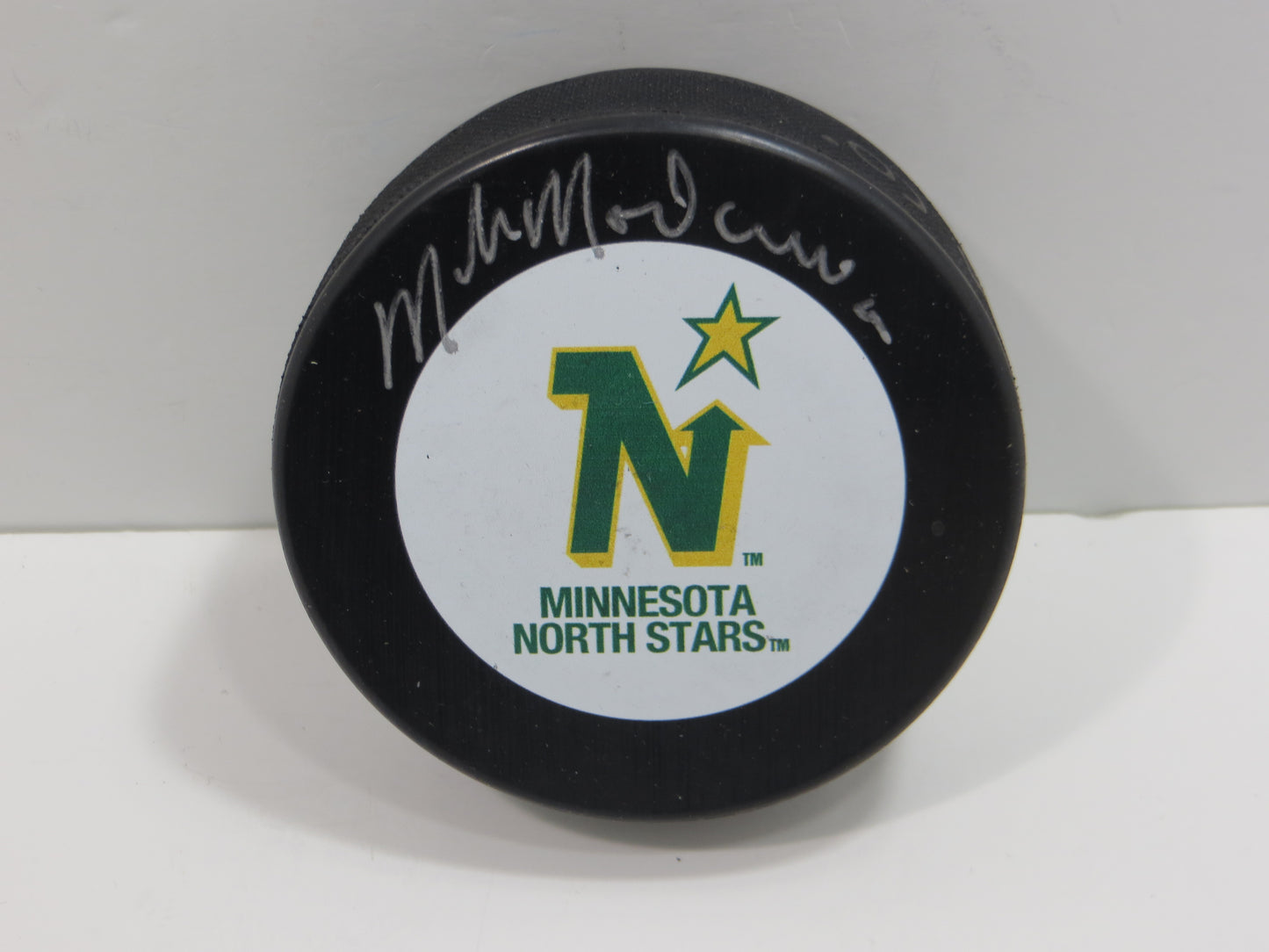 MIKE MODANO MINNESOTA NORTH STARS SIGNED HOCKEY PUCK Dallas BAS COA