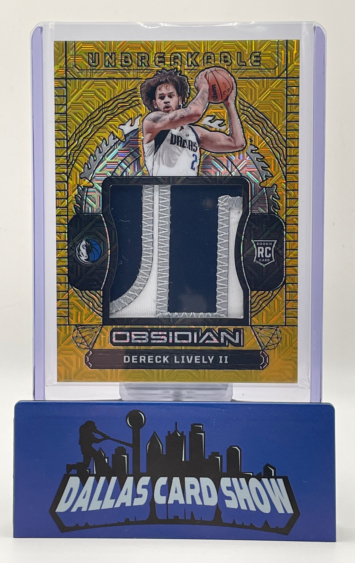 2023-24 Panini Obsidian #UM-DLI Dereck Lively Unbreakable Gold Mojo Relic /10