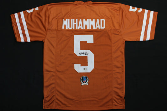MALIK MUHAMMAD TEXAS LONGHRONS SIGNED FOOTBALL BURNT ORANGE JERSEY BAS COA