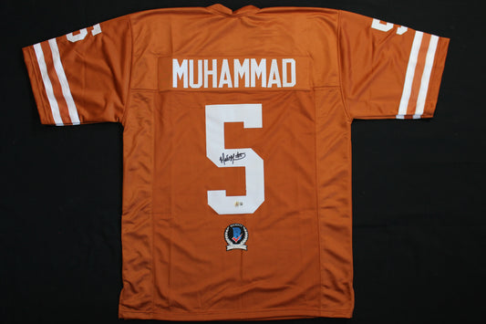 MALIK MUHAMMAD TEXAS LONGHRONS SIGNED FOOTBALL BURNT ORANGE JERSEY BAS COA