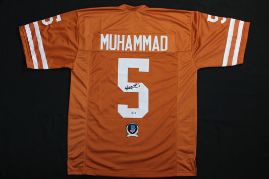 MALIK MUHAMMAD TEXAS LONGHRONS SIGNED FOOTBALL BURNT ORANGE JERSEY BAS COA