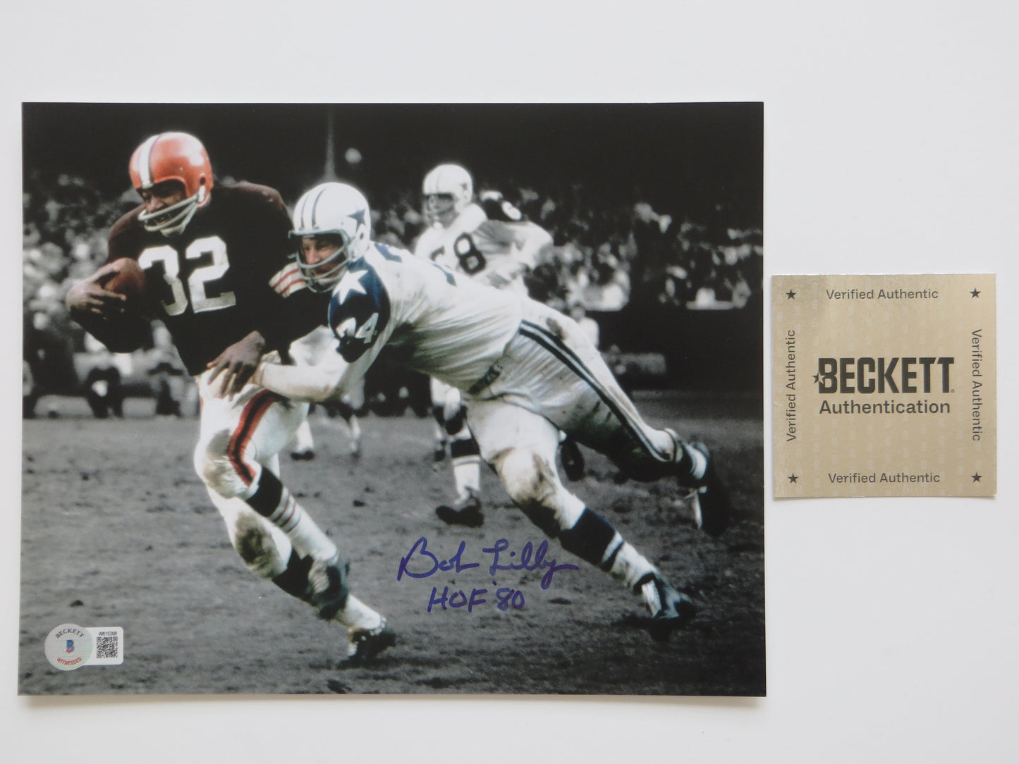 BOB LILLY DALLAS COWBOYS 8x10 PHOTO Tackling Jim Brown BAS