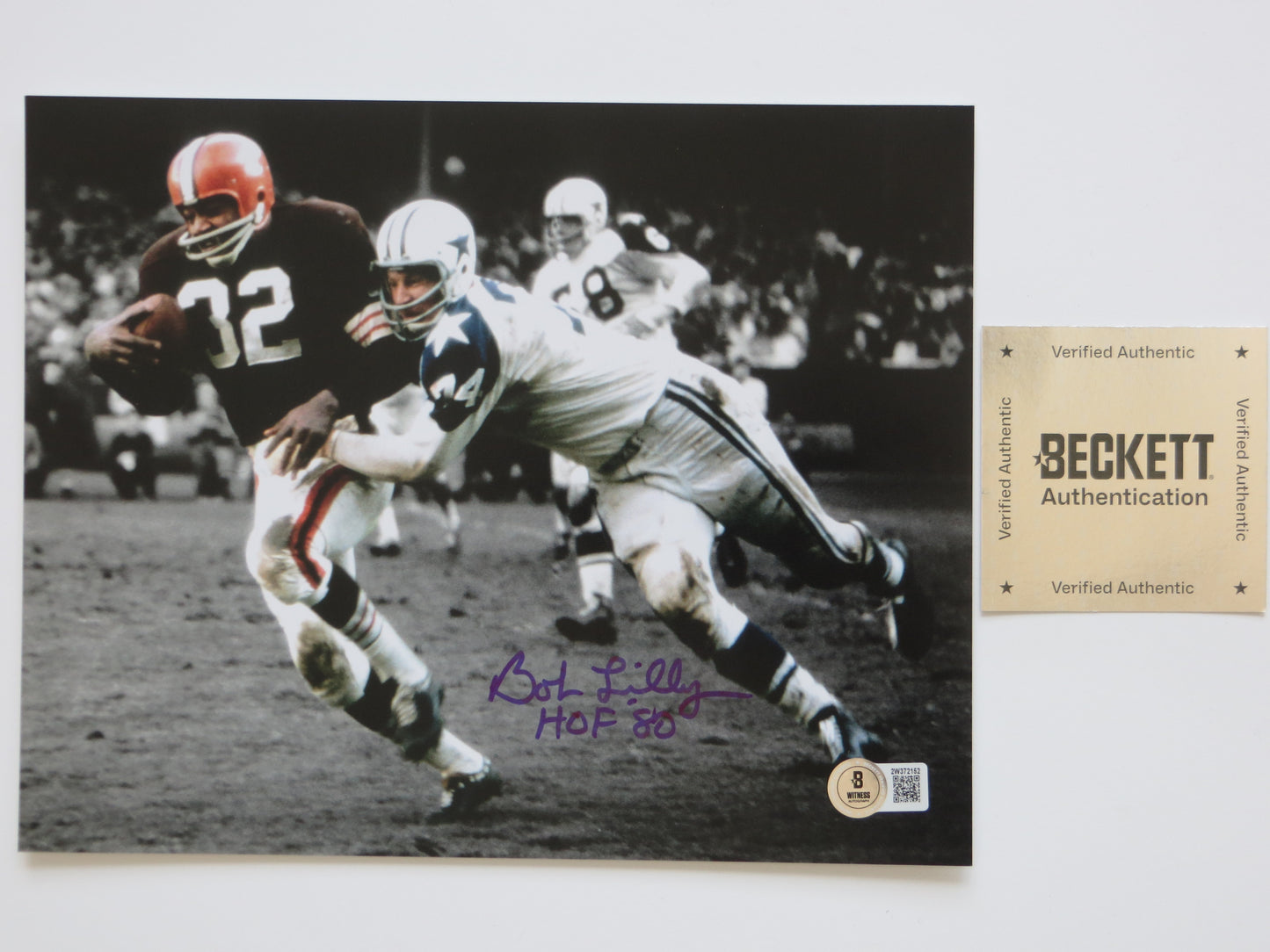 BOB LILLY DALLAS COWBOYS 8x10 PHOTO Tackling Jim Brown BAS