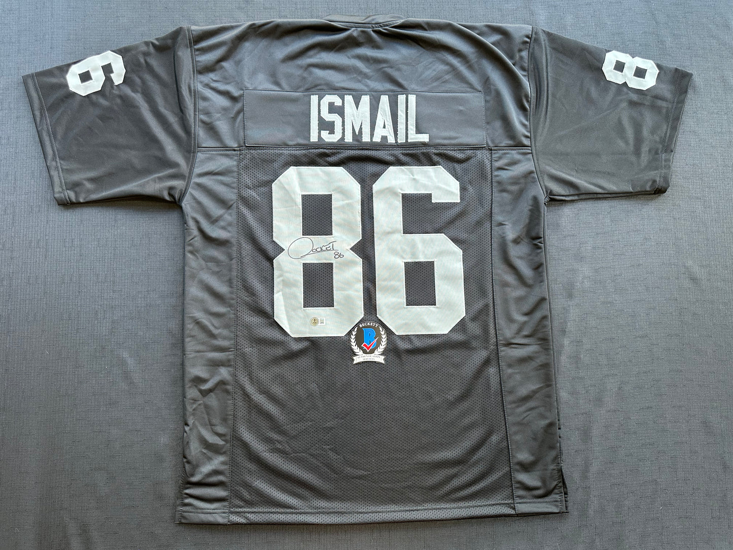 RAGHIB ROCKET ISMAIL RAIDERS SIGNED JERSEY Size XL COWBOYS BAS COA