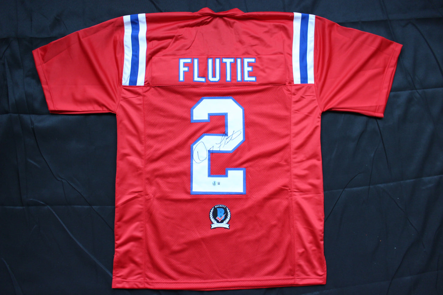 DOUG FLUTIE NEW ENGLAND PATRIOTS SIGNED FOOTBALL JERSEY Boston College Bills BAS COA
