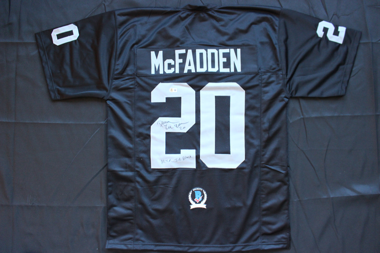 DARREN McFADDEN OAKLAND RAIDERS SIGNED FOOTBALL JERSEY w/MenInBlack Arkansas BAS