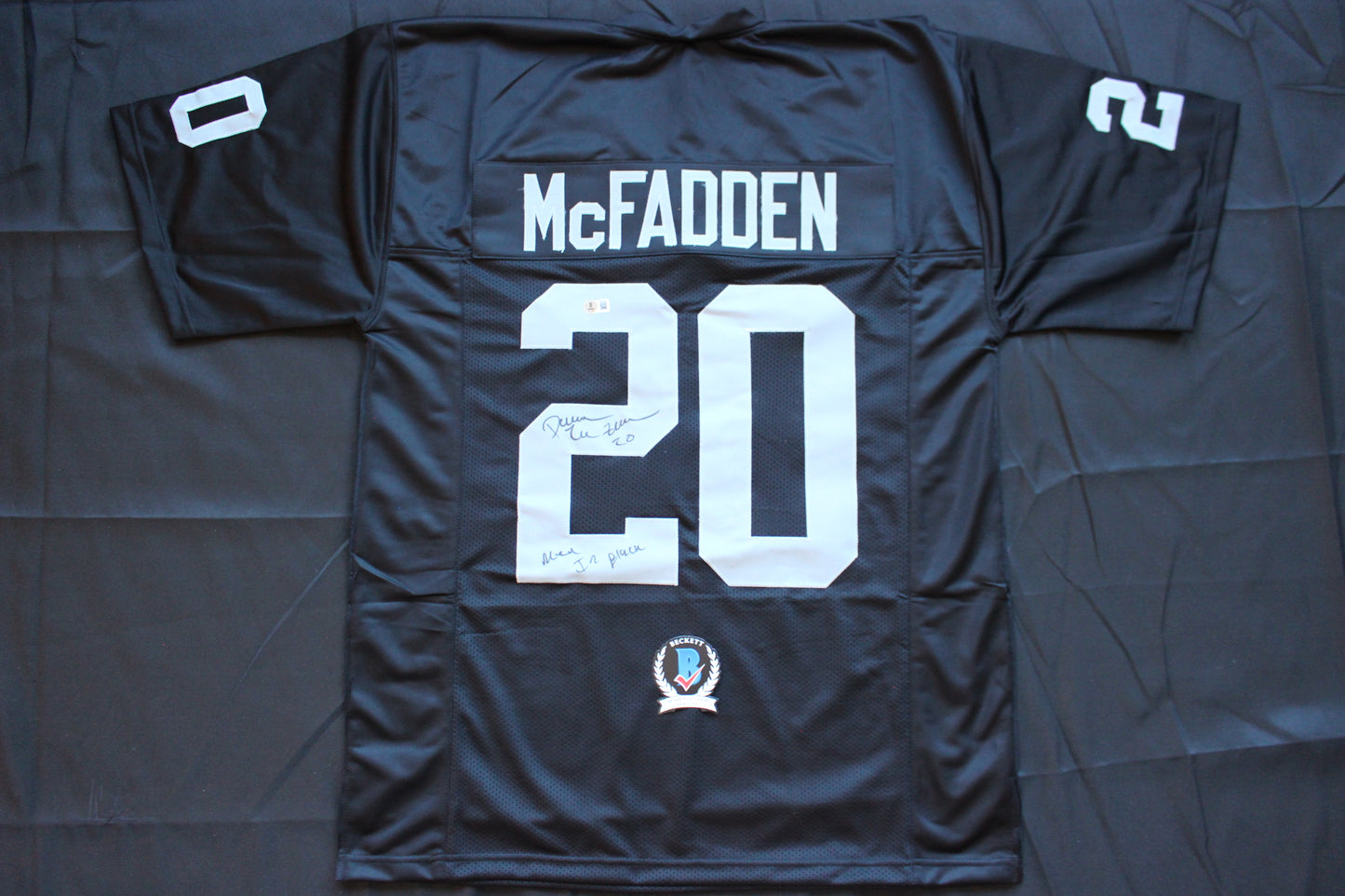 DARREN McFADDEN OAKLAND RAIDERS SIGNED FOOTBALL JERSEY w/MenInBlack Arkansas BAS