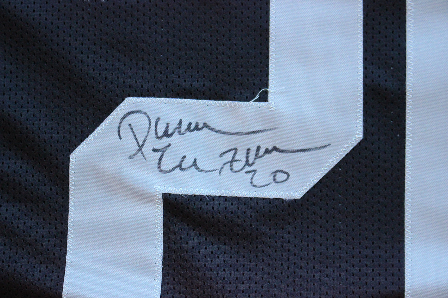 DARREN McFADDEN OAKLAND RAIDERS SIGNED FOOTBALL JERSEY w/MenInBlack Arkansas BAS