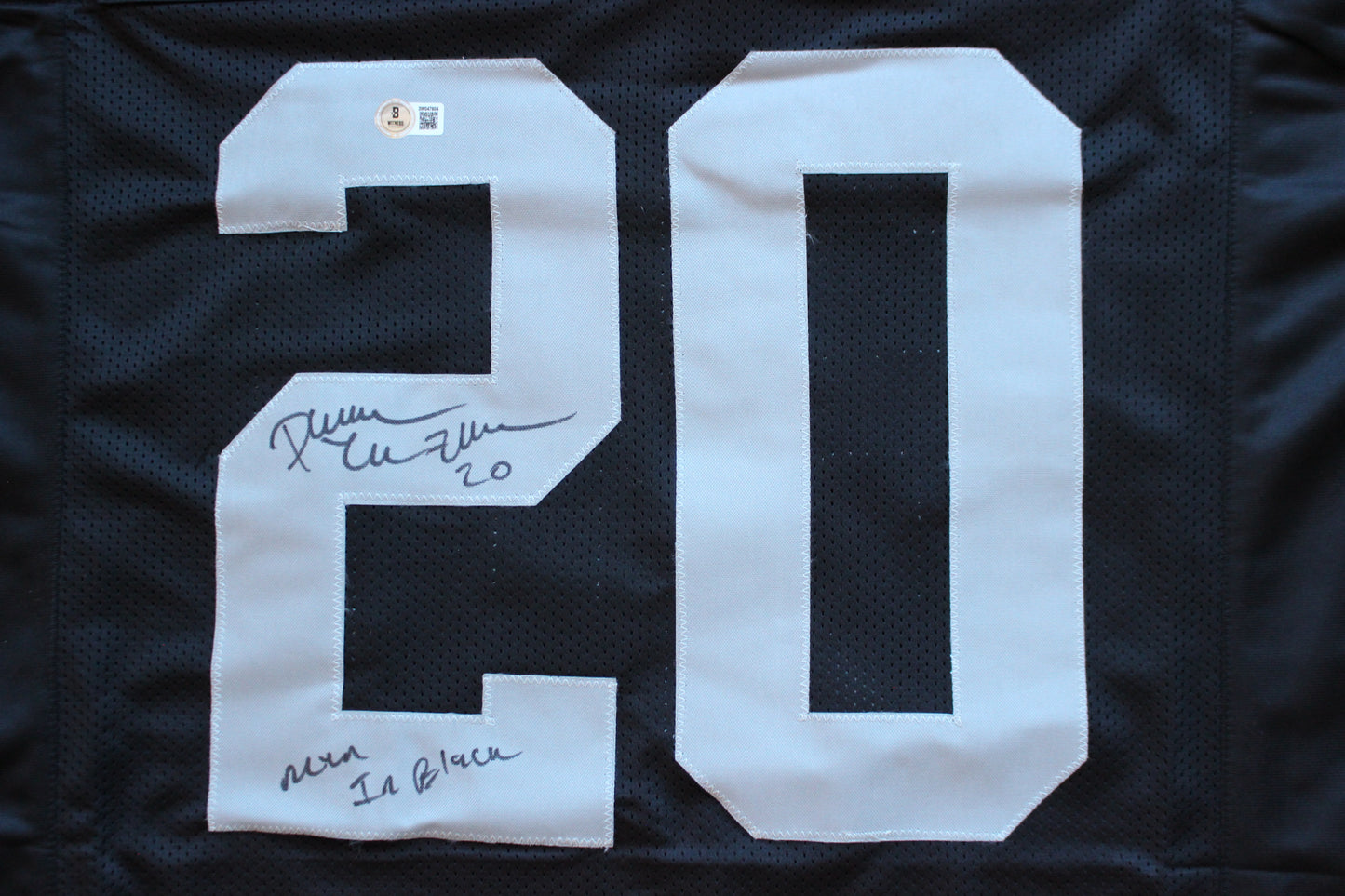 DARREN McFADDEN OAKLAND RAIDERS SIGNED FOOTBALL JERSEY w/MenInBlack Arkansas BAS