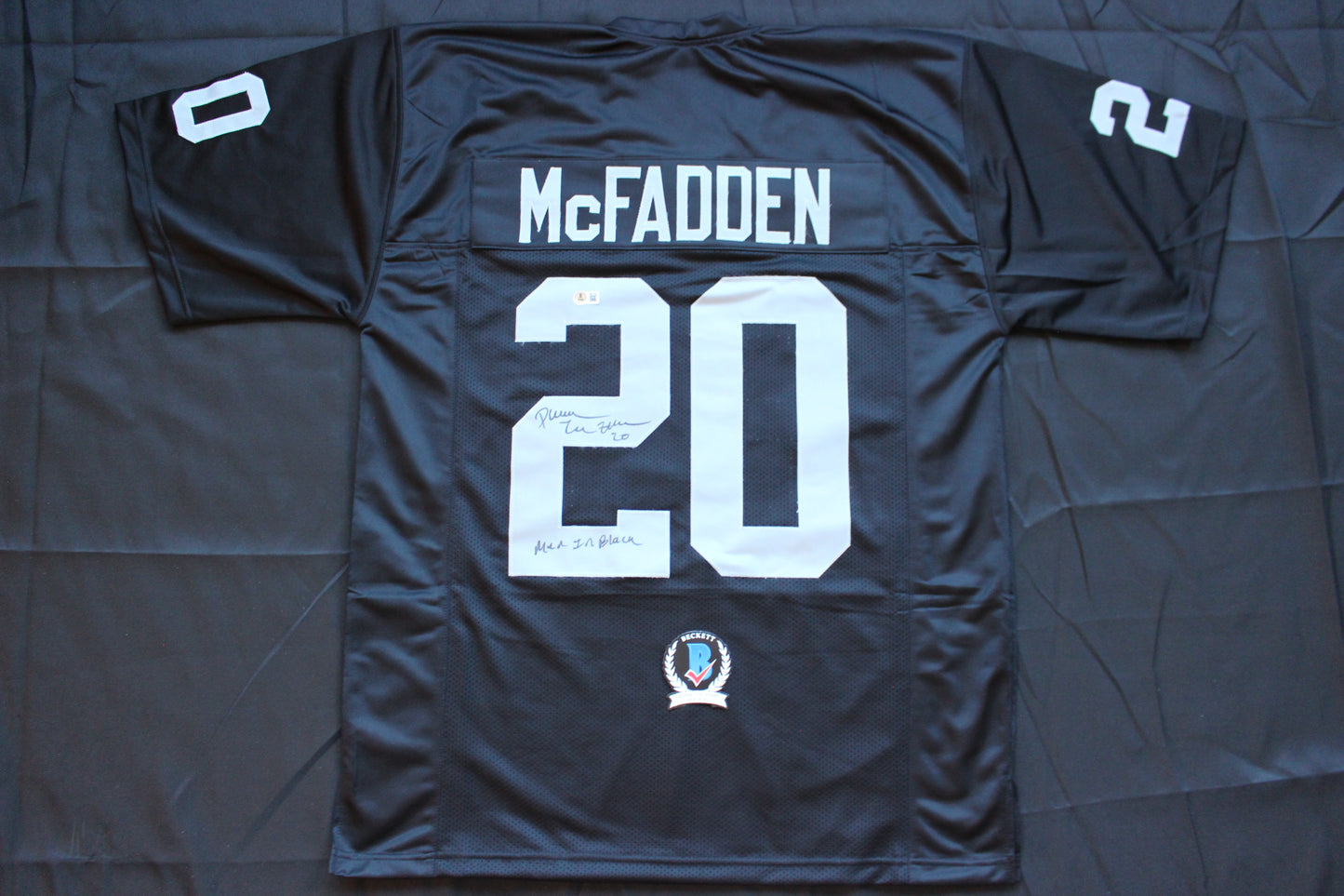 DARREN McFADDEN OAKLAND RAIDERS SIGNED FOOTBALL JERSEY w/MenInBlack Arkansas BAS