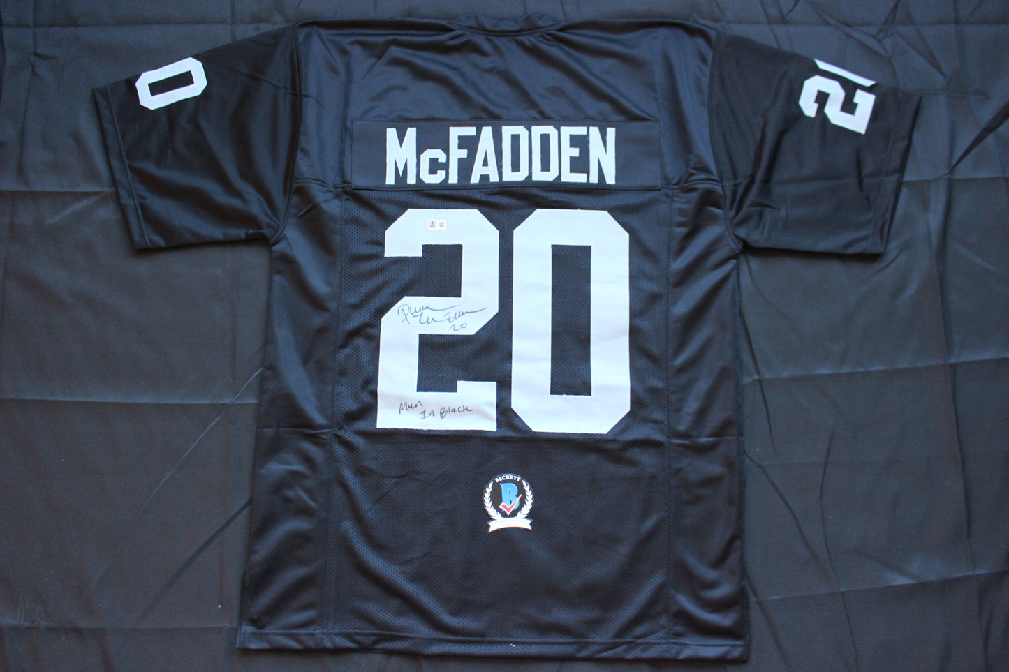 DARREN McFADDEN OAKLAND RAIDERS SIGNED FOOTBALL JERSEY w/MenInBlack Arkansas BAS