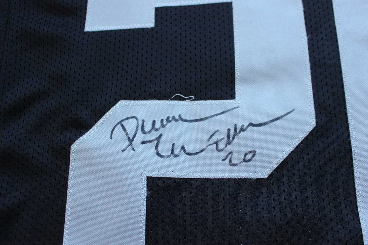 DARREN McFADDEN OAKLAND RAIDERS SIGNED FOOTBALL JERSEY w/MenInBlack Arkansas BAS