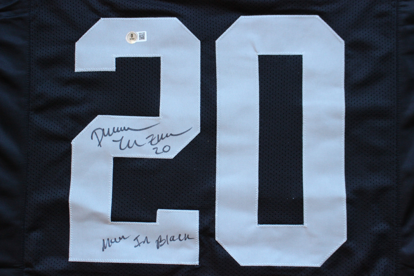DARREN McFADDEN OAKLAND RAIDERS SIGNED FOOTBALL JERSEY w/MenInBlack Arkansas BAS