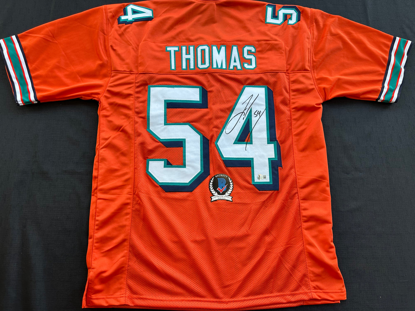 ZACH THOMAS SIGNED ORANGE FOOTBALL JERSEY Miami Dolphins BAS