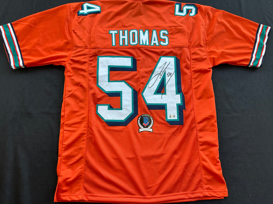 ZACH THOMAS SIGNED ORANGE FOOTBALL JERSEY Miami Dolphins BAS
