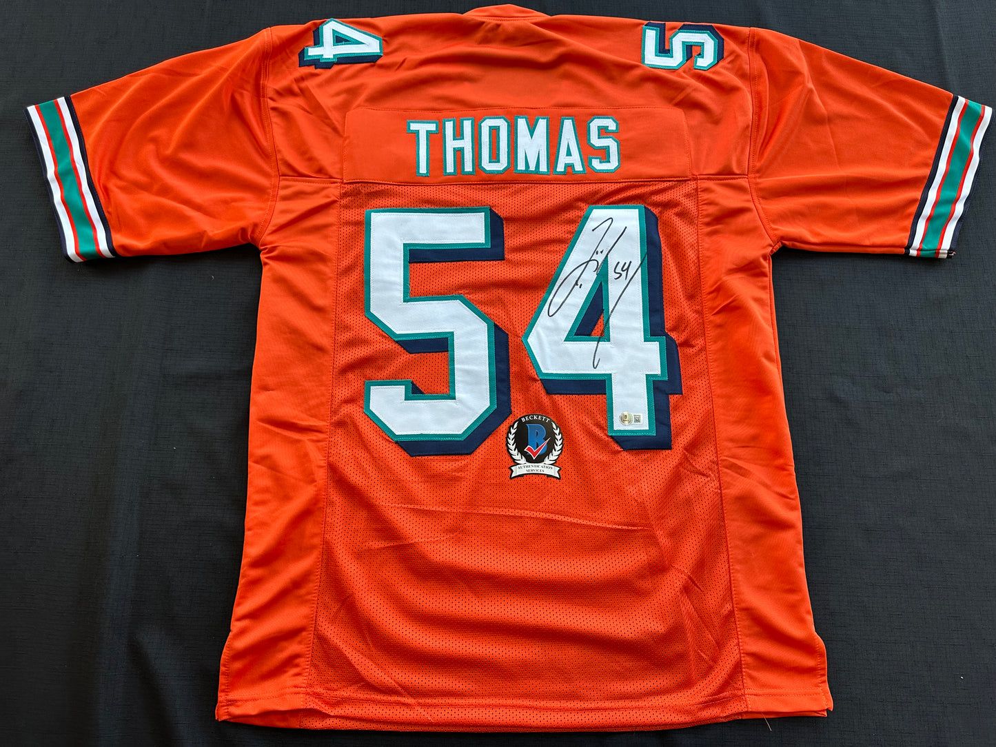 ZACH THOMAS SIGNED ORANGE FOOTBALL JERSEY Miami Dolphins BAS