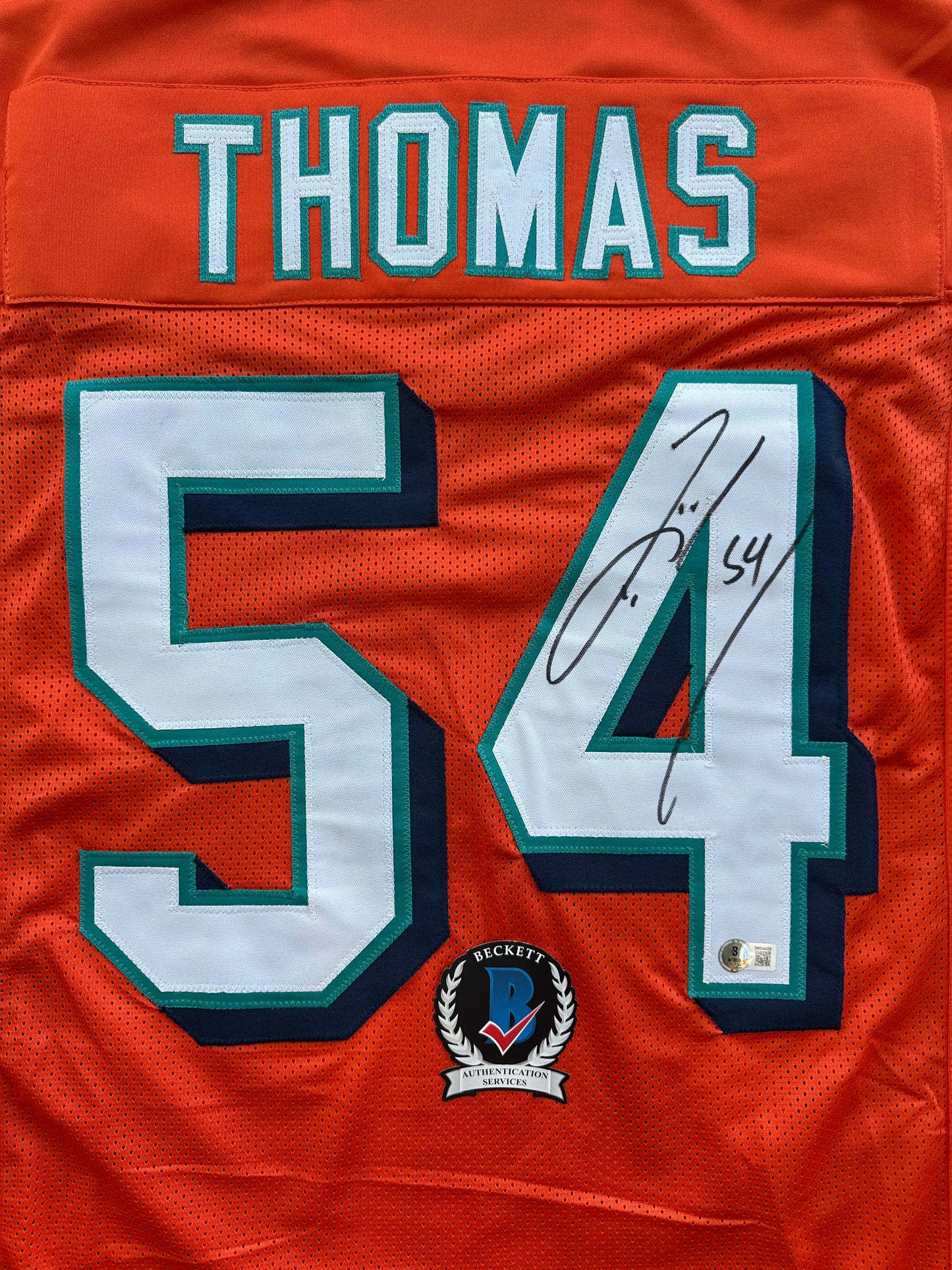 ZACH THOMAS SIGNED ORANGE FOOTBALL JERSEY Miami Dolphins BAS