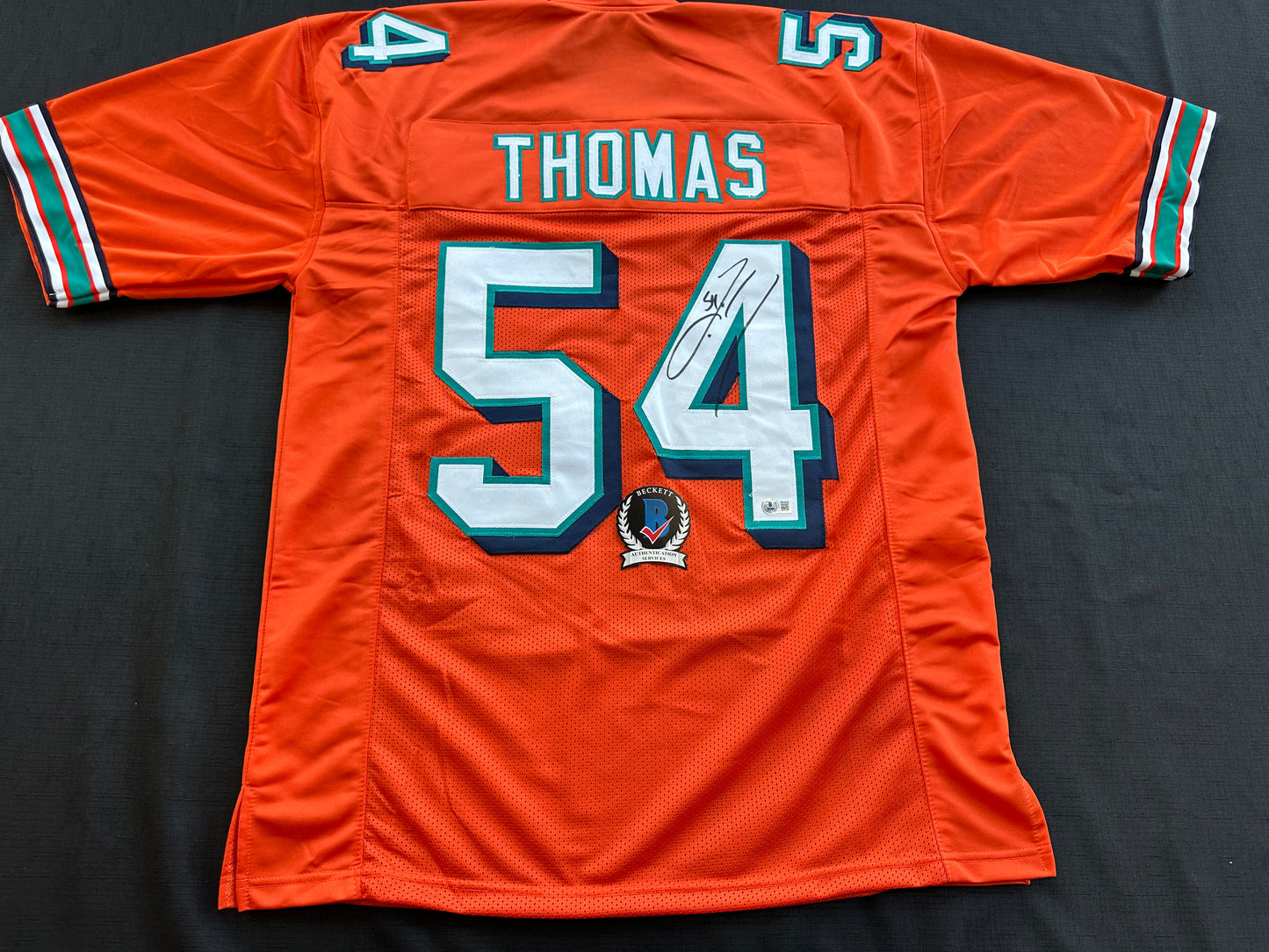 ZACH THOMAS SIGNED ORANGE FOOTBALL JERSEY Miami Dolphins BAS