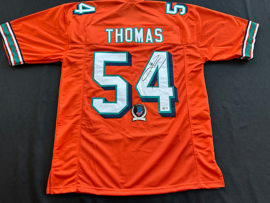 ZACH THOMAS SIGNED ORANGE FOOTBALL JERSEY Miami Dolphins BAS