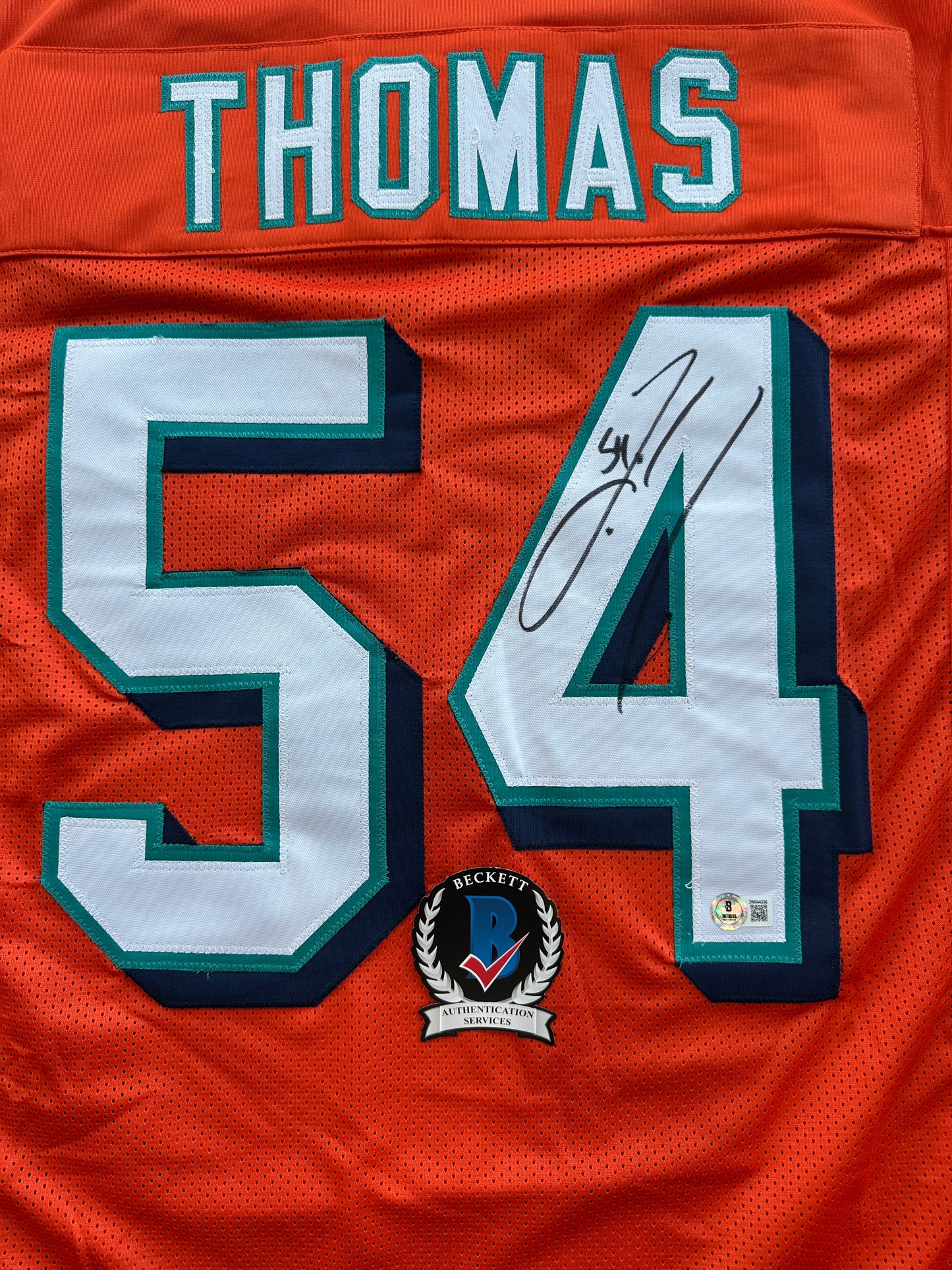 ZACH THOMAS SIGNED ORANGE FOOTBALL JERSEY Miami Dolphins BAS