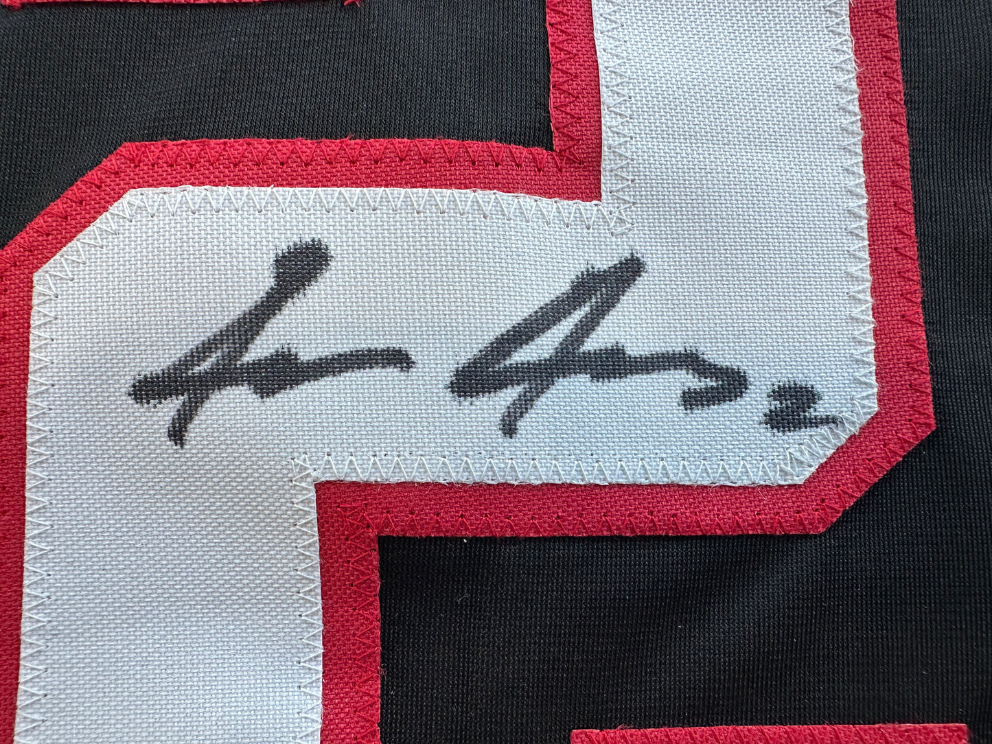 JACE JUNG SIGNED BLACK TEXAS TECH JERSEY BAS
