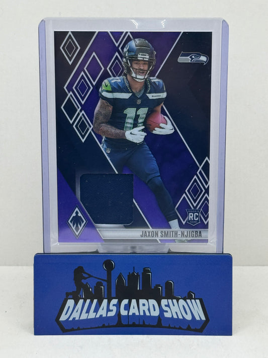 2023 Panini Phoenix #RME-JSN Jaxon Smith-Njigba Purple Memorabilia RC /75
