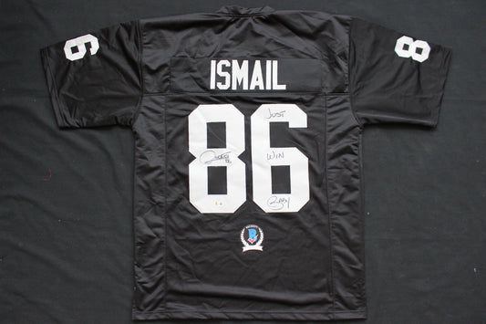 ROCKET ISMAIL RAIDERS SIGNED BLACK JERSEY w/JUST WIN BABY BAS COA