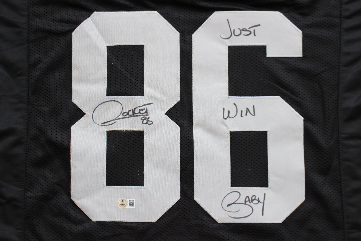 ROCKET ISMAIL RAIDERS SIGNED BLACK JERSEY w/JUST WIN BABY BAS COA