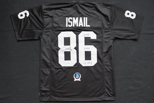 ROCKET ISMAIL RAIDERS SIGNED BLACK JERSEY w/JUST WIN BABY BAS COA