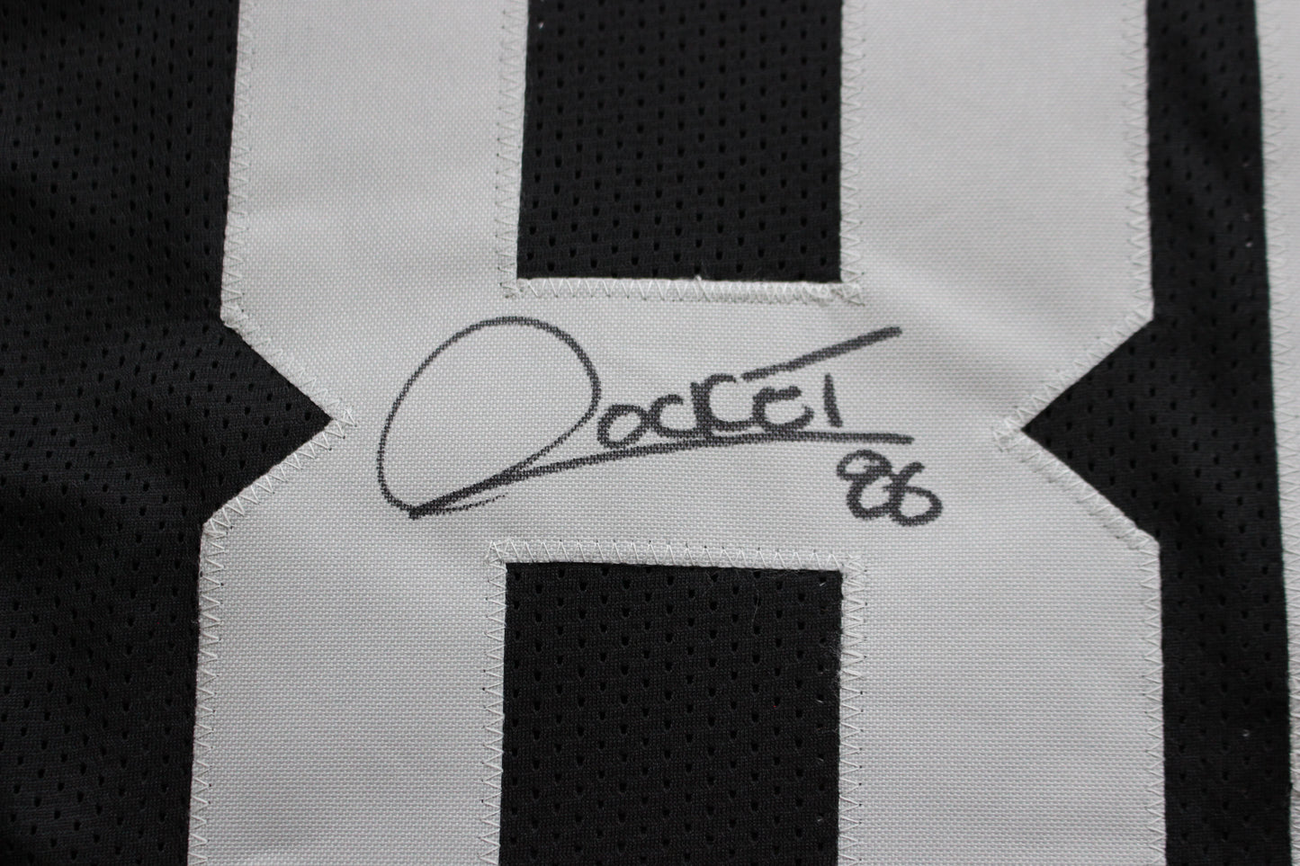 ROCKET ISMAIL RAIDERS SIGNED BLACK JERSEY w/JUST WIN BABY BAS COA