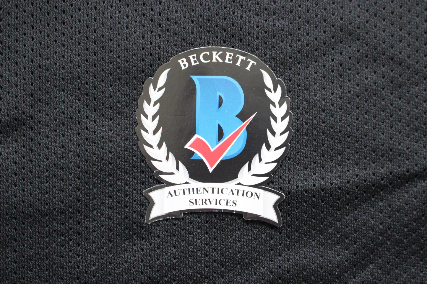 ROCKET ISMAIL RAIDERS SIGNED BLACK JERSEY w/JUST WIN BABY BAS COA