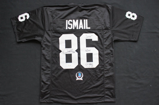 ROCKET ISMAIL RAIDERS SIGNED BLACK JERSEY w/JUST WIN BABY BAS COA